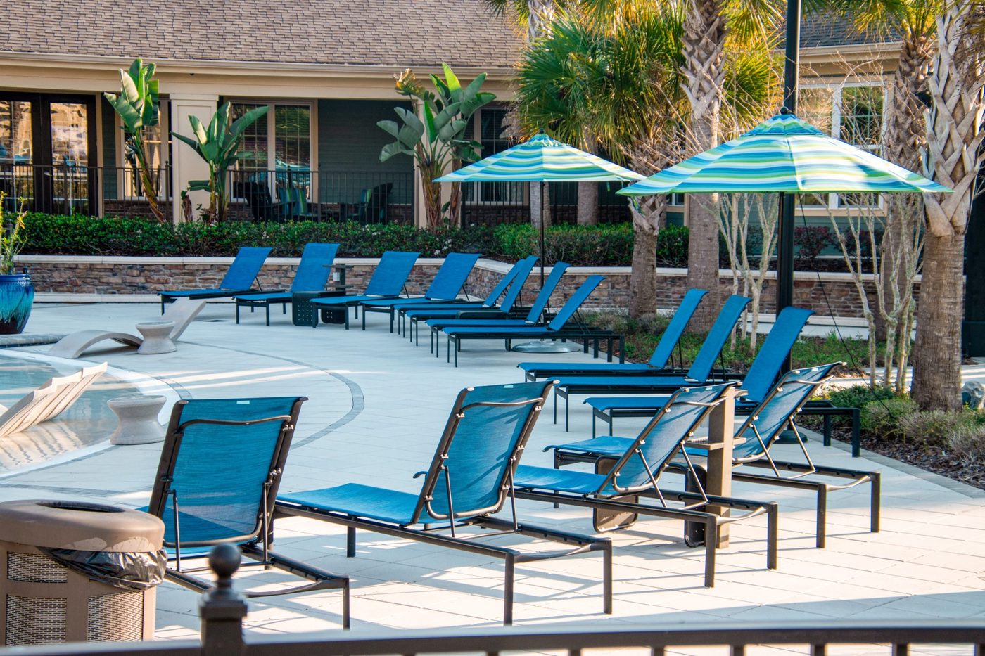 Resort pool deck with lounge chairs